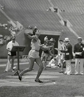 United States W. Charles Performing in The Decathlon Discus Event at Olympics