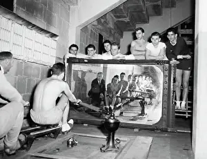 Rowing Prints: University Rowing Team Practicing in Front of Mirror