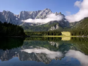 Images Dated 22nd June 2012: Upper Lake Fusine, Fusine Lakes, Laghi di Fusine lakes, the north face of the Mangart mountain at