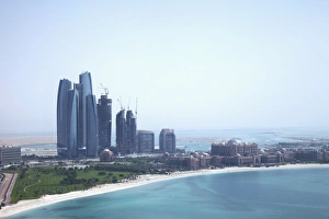 Cultural Image Gallery: Urban skyline by tropical beach