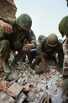 Gruesome Prints: U.S. Marines Digging Through Rubble to Reach Trapped Soldier