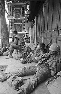 U.S. Marines Taking a Break in Vietnamese City