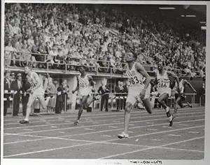Thane Baker Prints: U.S. Olympic Runner Andy Stanefield Winning Race