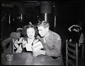Private Prints: U.S. Private and Japanese Girl Look at Book
