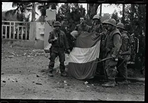 U.S. Soldiers Dismantling Viet Cong Flag