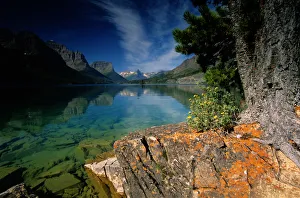 Montana Collection: USA, Montana, Glacier NP, Lake St. Mary, water reflecting surrounding