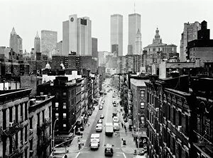 USA, New York City, Chinatown street and Manhattan skyline (B&W)