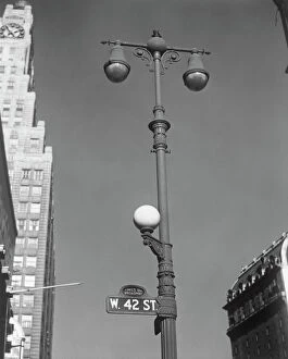 Urban Scene Gallery: USA, New York, New York City, lamp post on West 42nd Street, low angle view