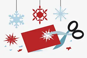Medium Group Of Objects Prints: Using scissors to cut out snowflake shapes for Christmas decorations