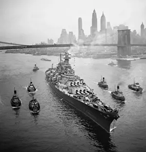 USS Missouri sailing under Bridge