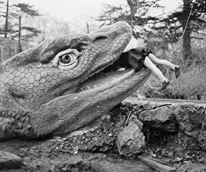 Valerie Burwood Climbing Inside a Dinosaur's Mouth