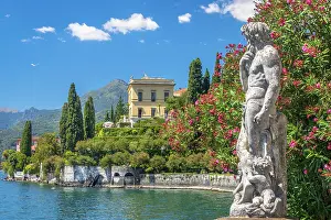 Varenna, Lombardy, Italy - July 2022: Statue in Villa Monastero overlooking Lake Como