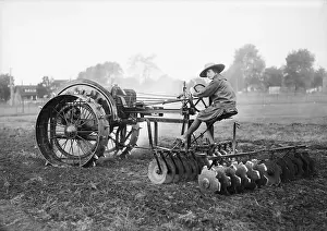 Springfield Prints: Vassar Girl Riding Tractor
