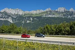 Multiple Lane Highway Gallery: Vehicles on the A3 motorway in front of the Churfirsten range near Lake Walen, Canton of St