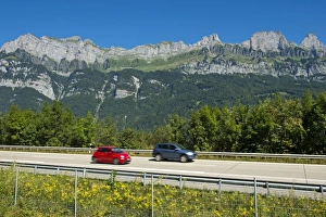 Multiple Lane Highway Gallery: Vehicles on the A3 motorway in front of the Churfirsten range near Lake Walen, Canton of St