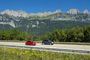 Mountain Chain Prints: Vehicles on the A3 motorway in front of the Churfirsten range near Lake Walen