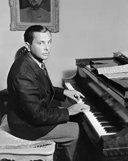 Vernon Duke Playing Piano
