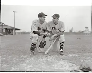 Vernon Kennedy and Lou Boudreau Kneeling and Conversing on Field