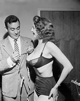 Vernon Scott Measuring Tempest Storm's Dimensions