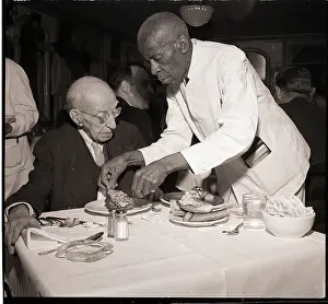 Waiter Prints: Veteran Waiter Serving Loyal Customer