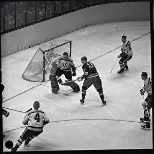 Vic Hadfield and Bruce Gamble in Hockey Action