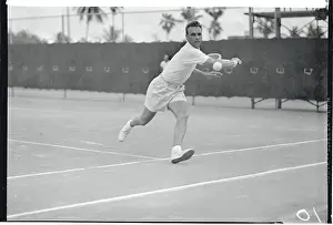 Vic Seixas Hitting a Tennis Ball