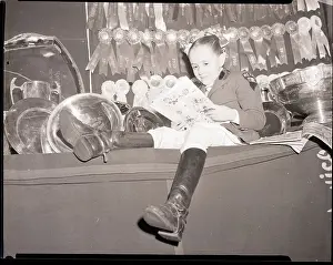 Equestrian Prints: Vicki Mariles Reading with Medal and Trophies