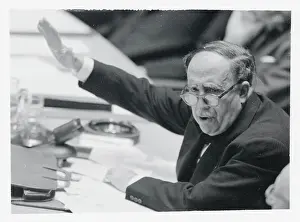 Victor A. Belaunde Holding Arm up as He Speaks to Delegation