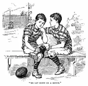 Boys Gallery: Two Victorian boys in rugby football kit talking on a bench
