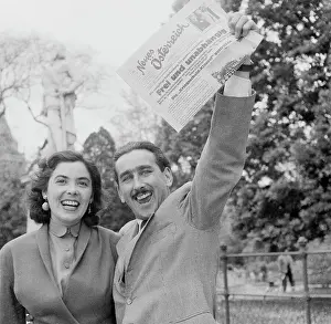 Viennese Couple Waving Newspaper