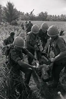 Vietnam Casualty Carried by His Comrades