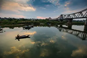 Vietnam - Fisherman in Long Bien bridge on Song Hong river, Hanoi