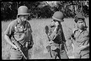 Vietnamese and American Officers in Action