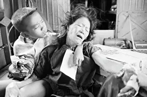 Comforting Prints: Vietnamese Boy Comforting Wounded Mother