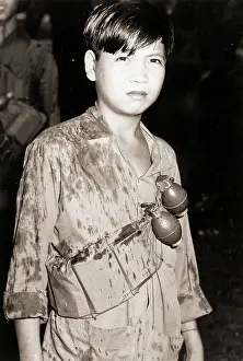 Vietnamese Boy Soldier with Grenades