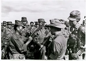Vietnamese Soldiers Preparing Rifles