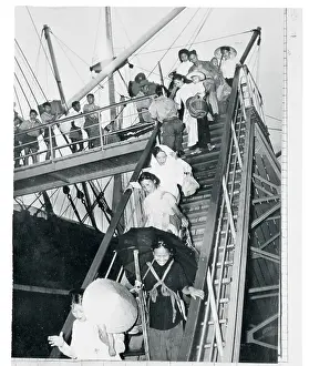 Saigon Prints: Vietnamese Travelers Goods Being Unloaded from Ship