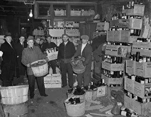 View of Agents Seizing Liquor Bottles