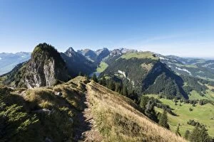 View of the Appenzell Alps as seen from the geological mountain trail, lake Saemtisersee below