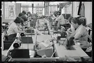 View of Asian Women Toiling in Sweatshop