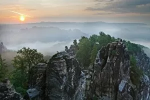 View from the Bastei rock formation, sunrise, fog, Saxon Switzerland National Park, Saxon Switzerland region, Saxony