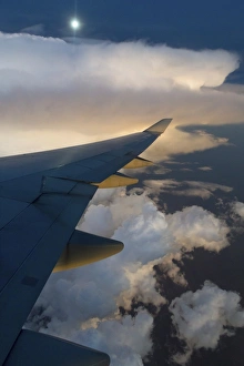 Images Dated 26th January 2013: View from a Boeing 747-400 of a storm front at full moon, Australia