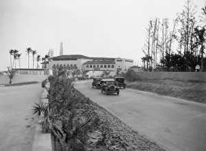 View of Cars on Ocean Drive Near Bath and Tennis Club by Joseph Urban