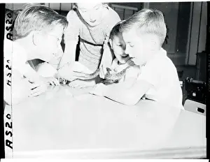 View of Children Handling Snake