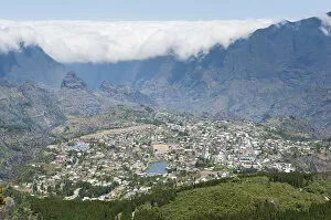 View over the city and the For?t du Grand Matarum, wall of clouds, Cirque de Cilaos, Cilaos, French Overseas Territory