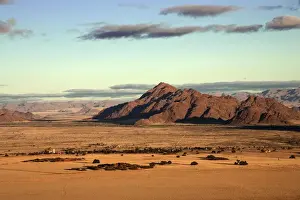 Barrenness Prints: View from Elim Dune onto grass steppe, Sesriem Camp and Tsaris Mountains, Namib Desert
