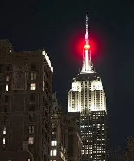 View of the top of the empire state Buildin at night in Manhattan, New York City