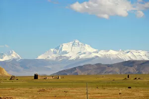 View towards the entire massif of Mount Everest, ruins in the valley near Old Tingri, Himalayas, Central Tibet, U-Tsang