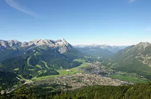 View of Garmisch-Partenkirchen, Zugspitze mountain, Jubilaeumsgrat ridge and Alpspitze mountain as seen from Wank
