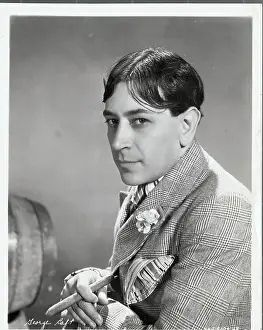 Side View of George Raft with Cigar